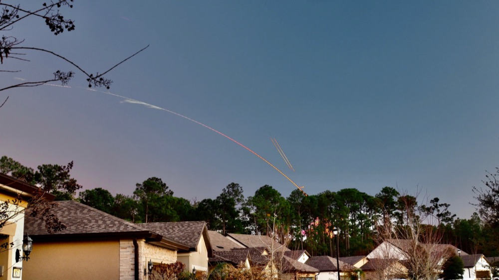 Live composite exposure of the light trail from the Falcon Heavy launch as viewed from Ponte Vedra. Arc ascending from right to left. Two short , parallel light trails mark the reentry burns of the two side boosters landing at KSC.
