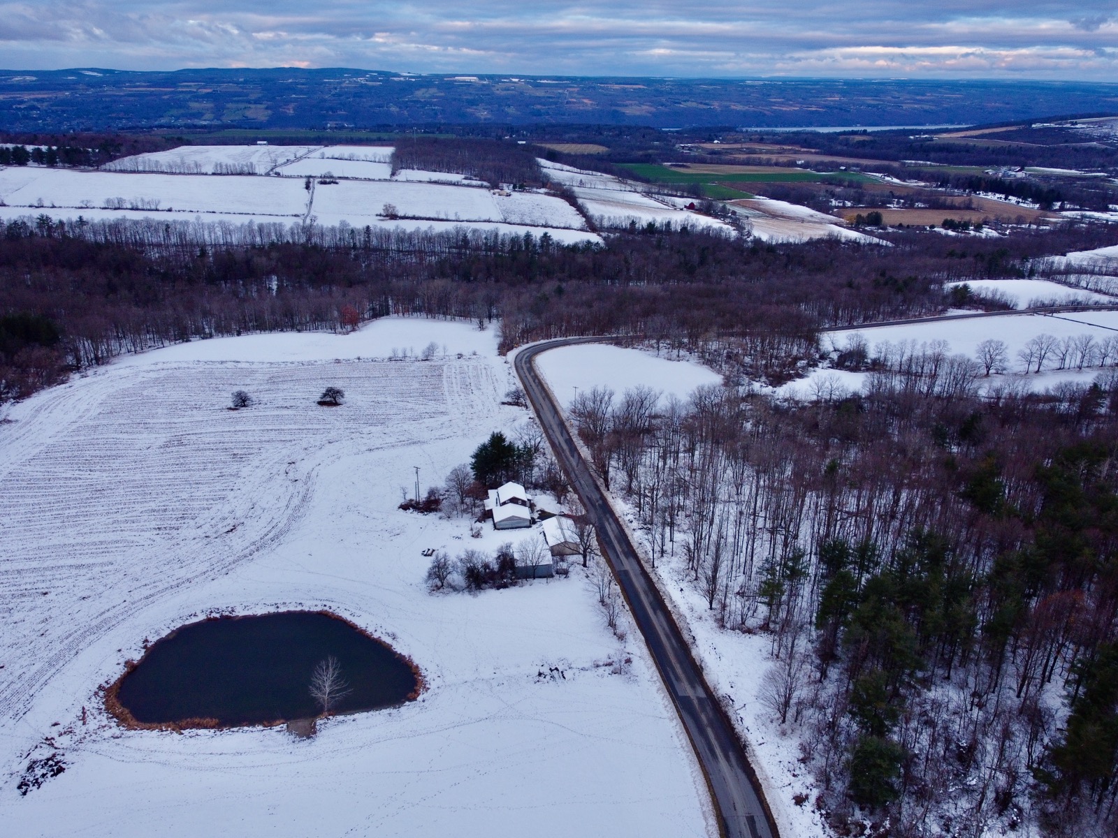 Aerial view of a snowy rural landscape