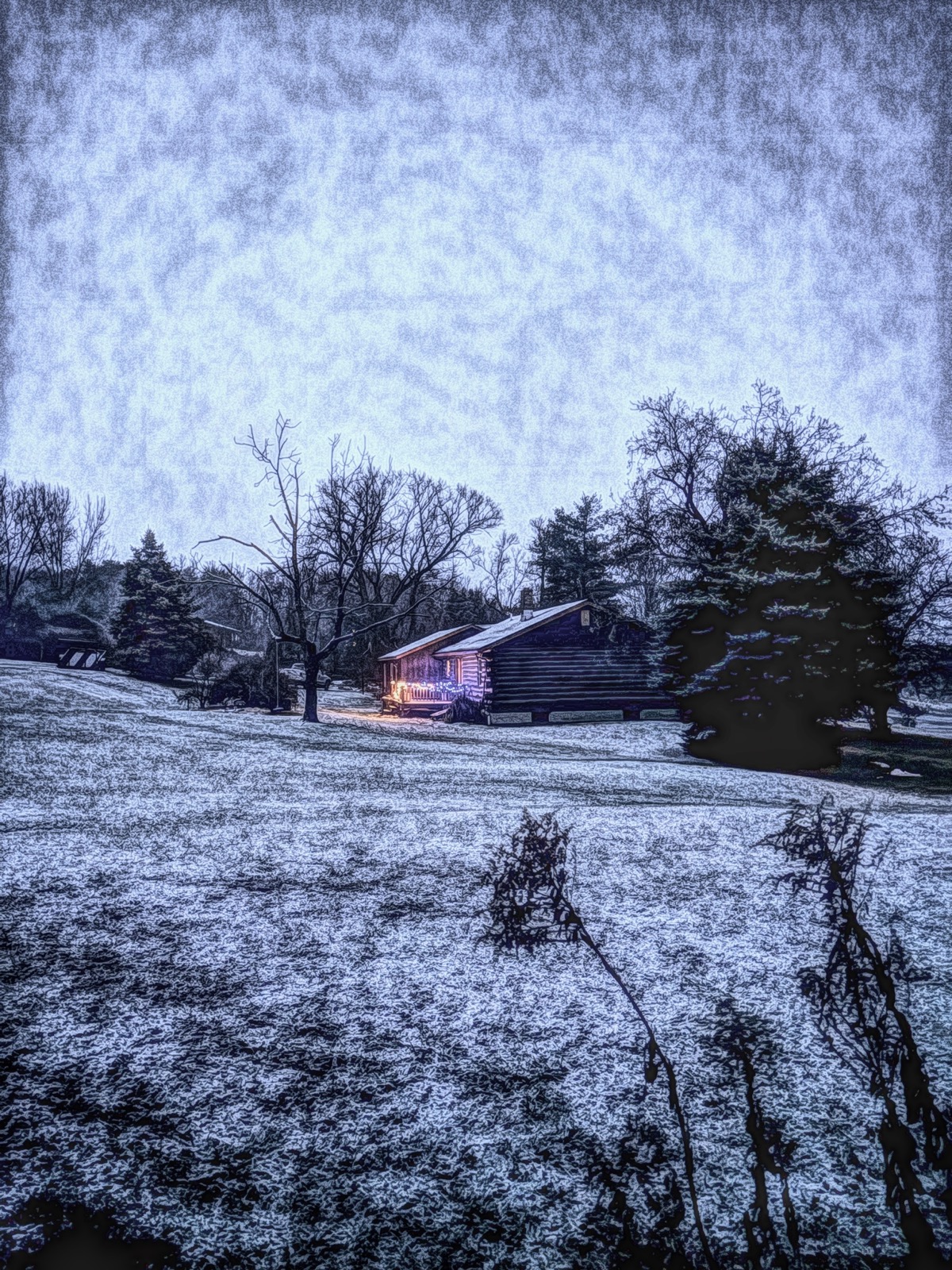 Photo of a rural home in a winter landscape