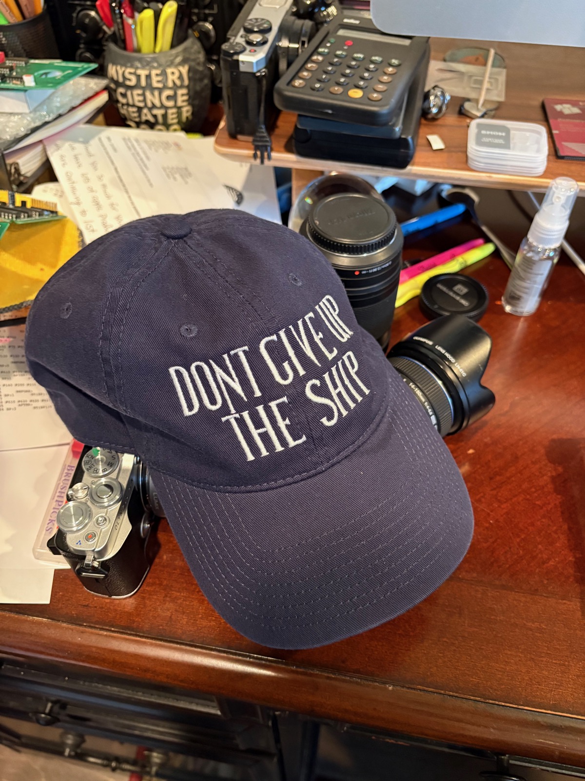 Photo of a baseball cap with the words, 