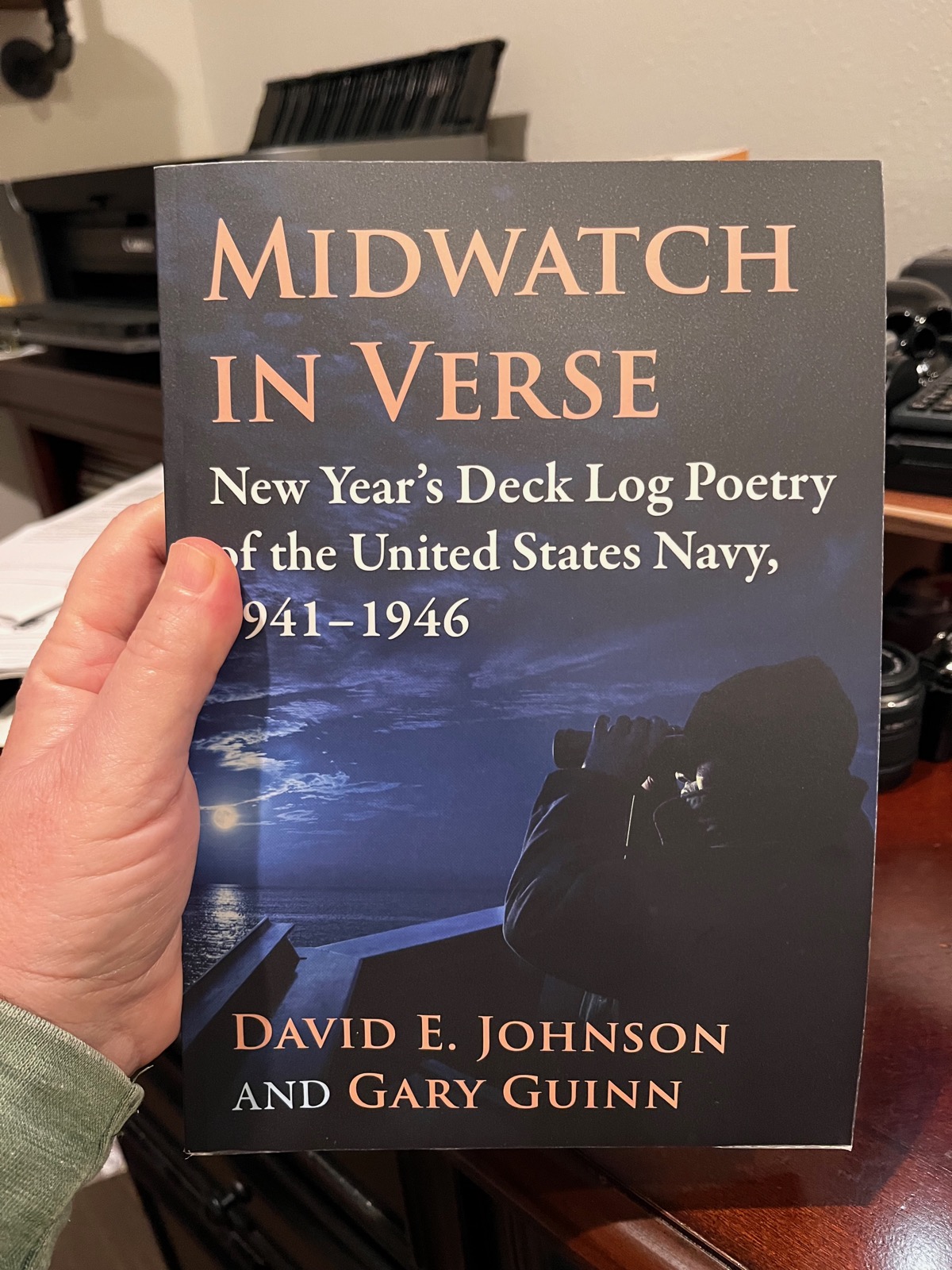 Photo of a book called Midwatch in Verse, New Year's Deck Log Poetry of the United States Navy, 1941-1946