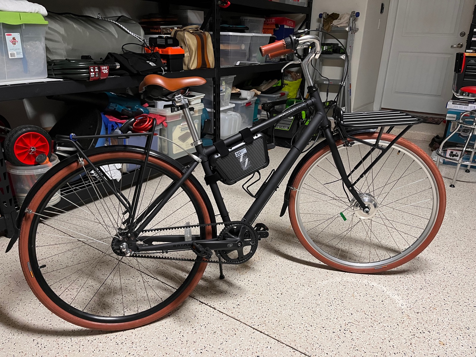 Photo of a Priority Classic bicycle in a garage