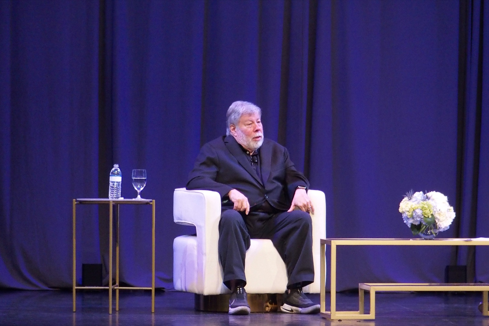 Photo of Steve Wozniak seated on stage at the Florida Forum January 17, 2024