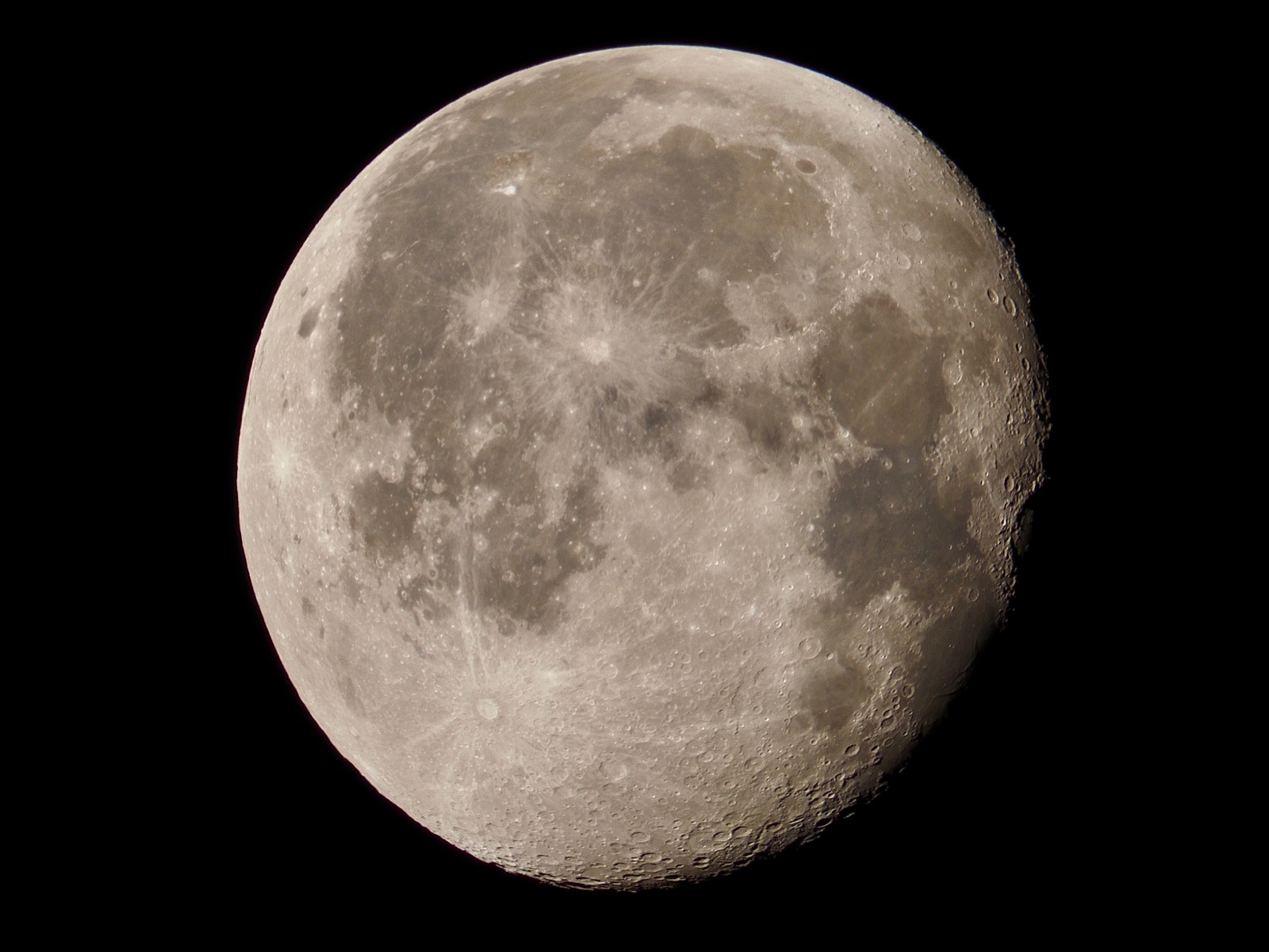 Closeup of the waning gibbous moon.