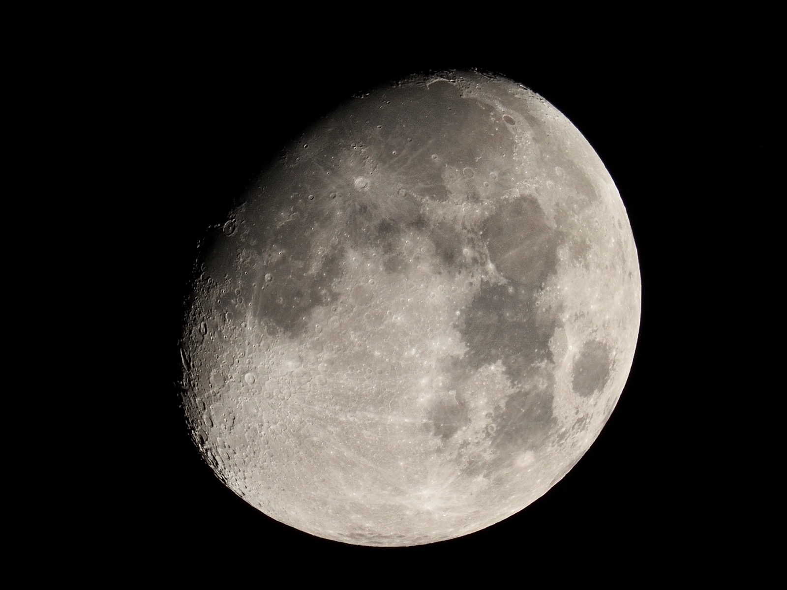 Closeup of waxing gibbous moon 87% illuminated
