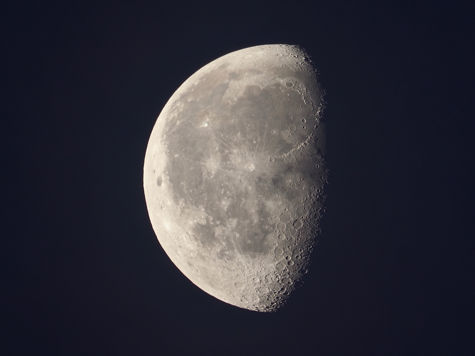 Closeup of waning gibbous moon. 67.5% illuminated