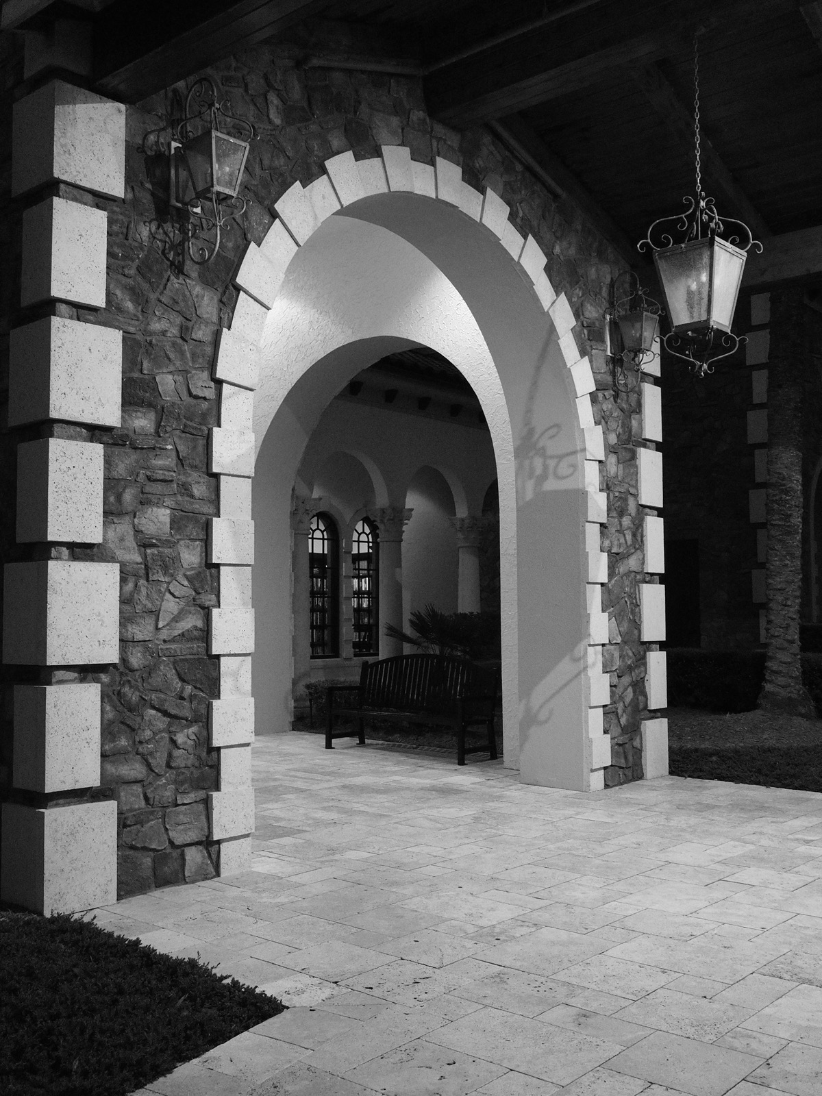 Two arches framed in an arch, framed in an arch in alternating orthogonal planes. B&W.