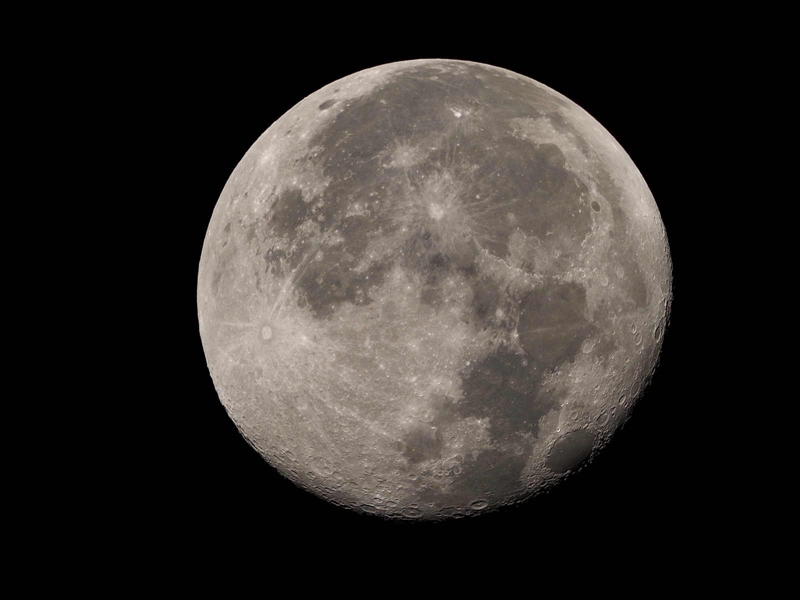 Telephoto closeup of the waning gibbous moon, 96% illuminated