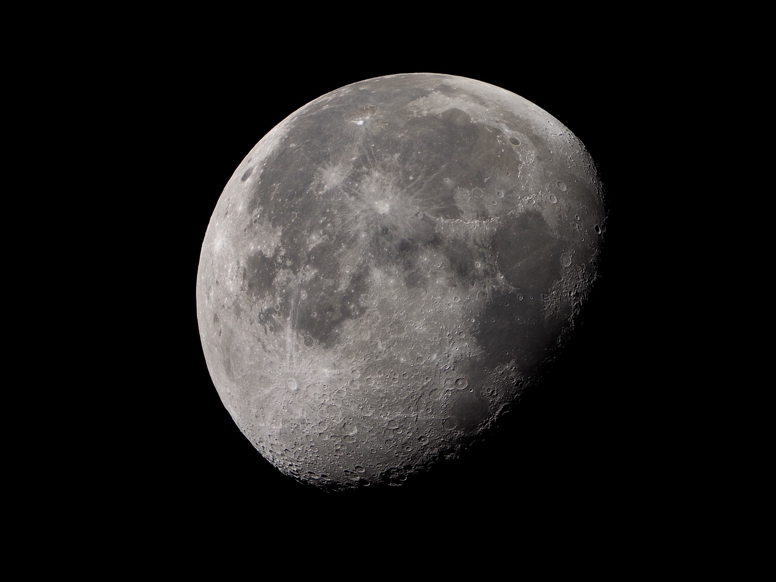 Telephoto closeup of the waning gibbous moon, 80.7% illuminated.