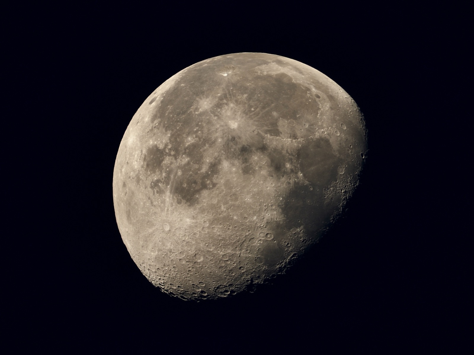 This morning's moon, 12-19-24. Telephoto closeup of the waning gibbous moon, 81% illuminated.