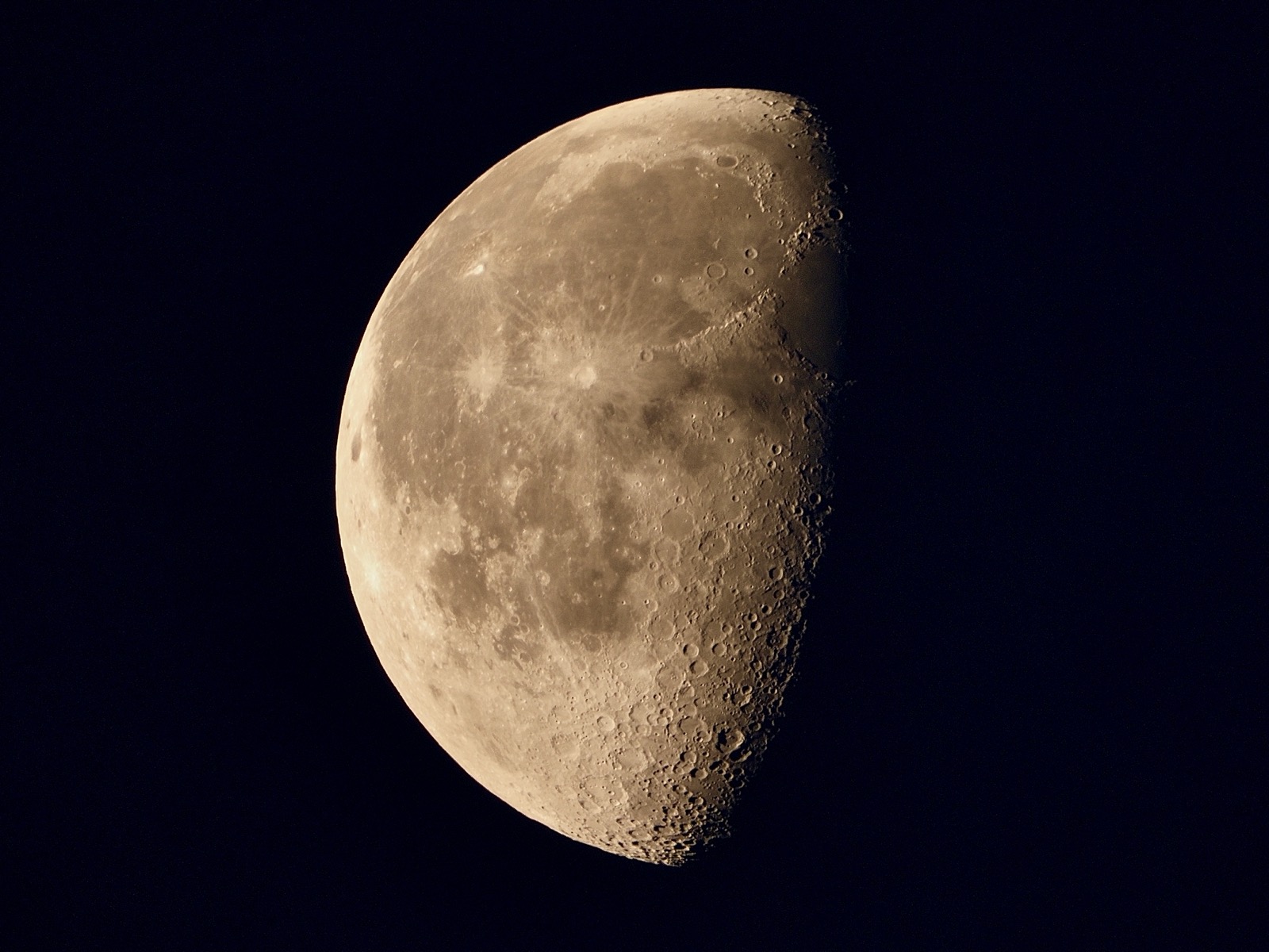 Telephoto closeup of the waning gibbous moon, 63% illuminated