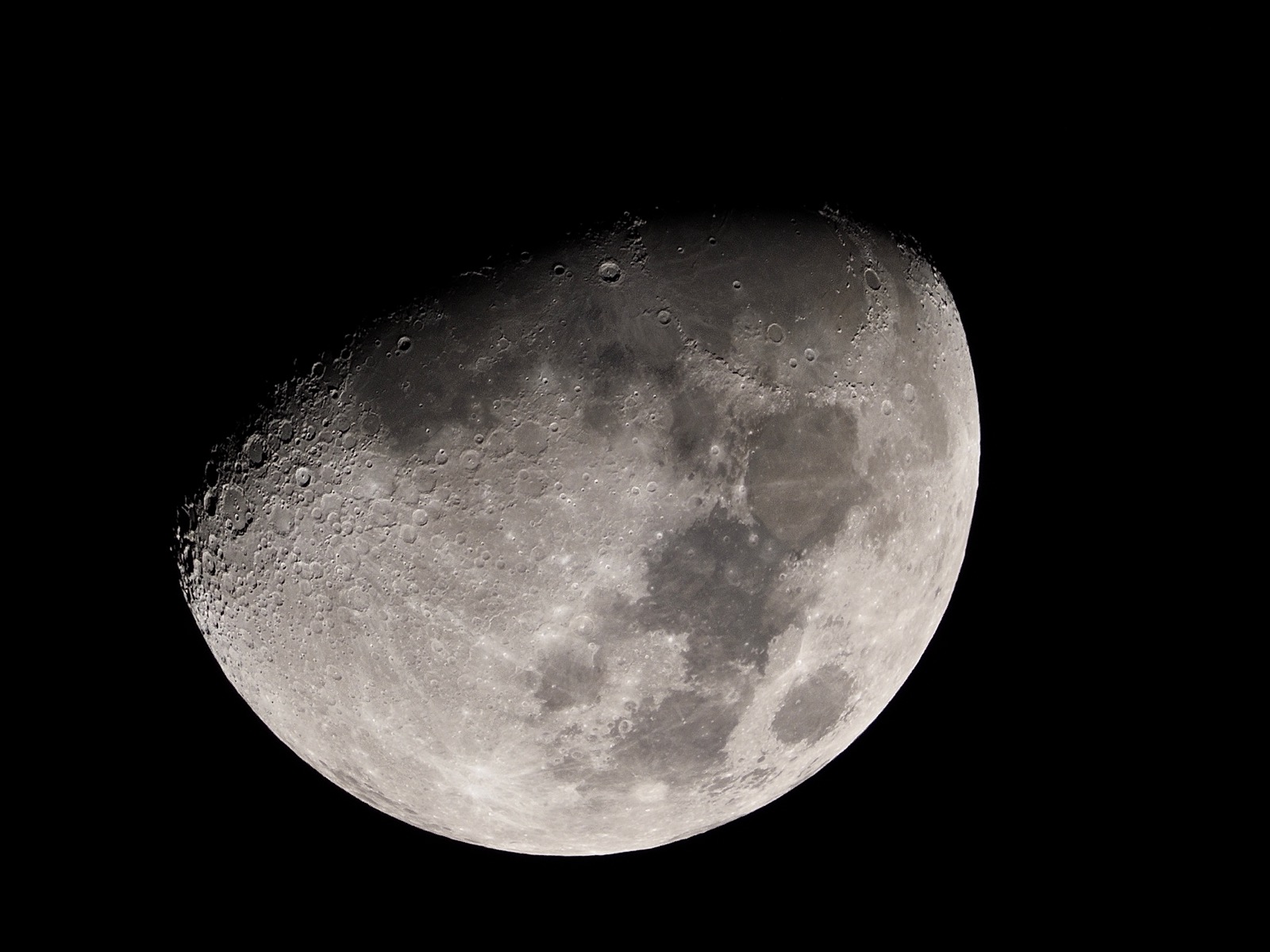 Telephoto closesup of the waxing gibbous moon, 67% illuminated