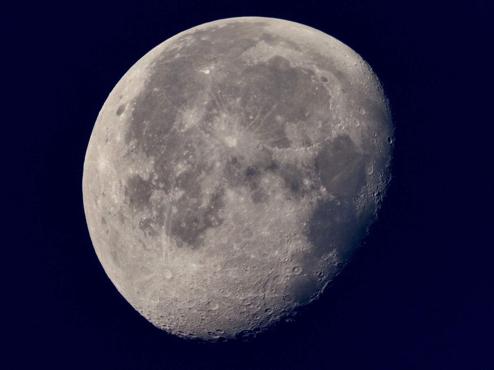 Telephoto closeup of the waning gibbous moon 86% illuminated
