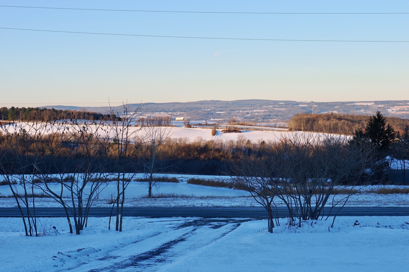 Snow covered hilly rural landscape