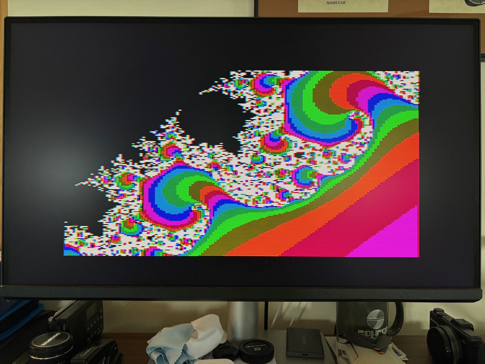 A portion of the Mandelbrot set being plotted by an 8-bit Apple IIc Plus