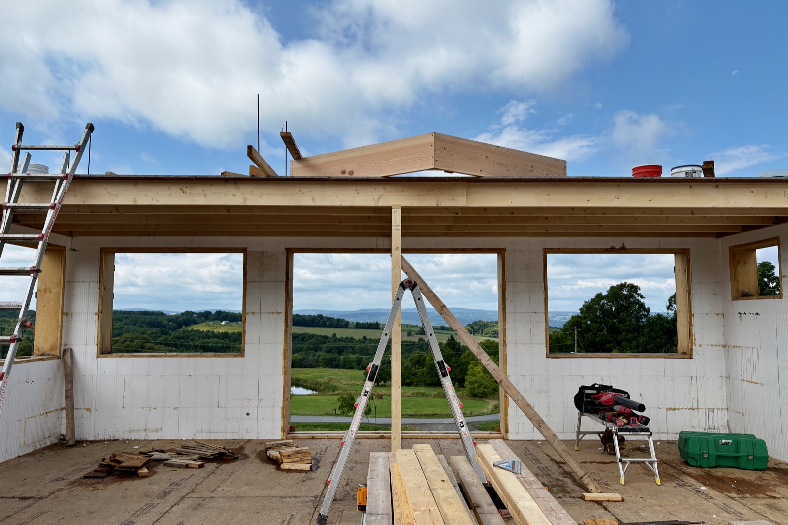 Interior position of an ICF location nether building overlooking a agrarian landscape