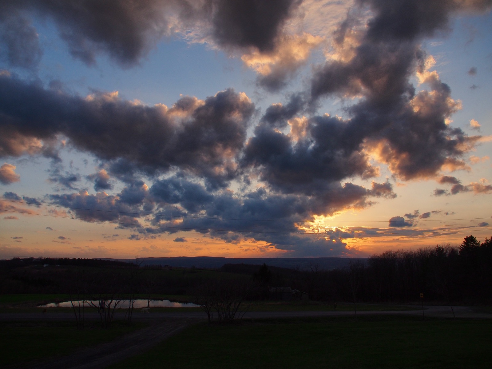 Some clouds backlit by the setting sun.