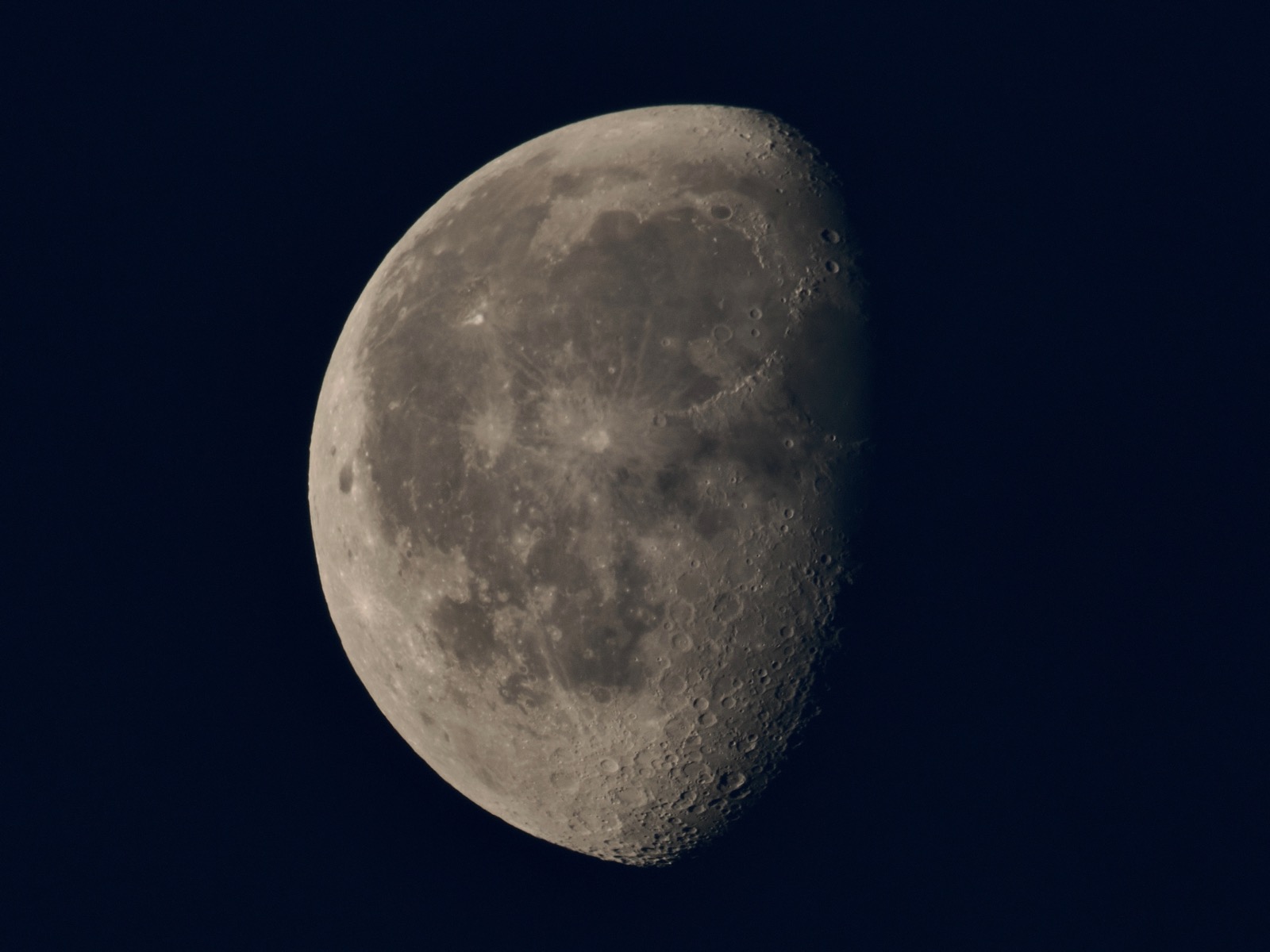 Telephoto closeup of the waning gibbous moon, 73% illuminate