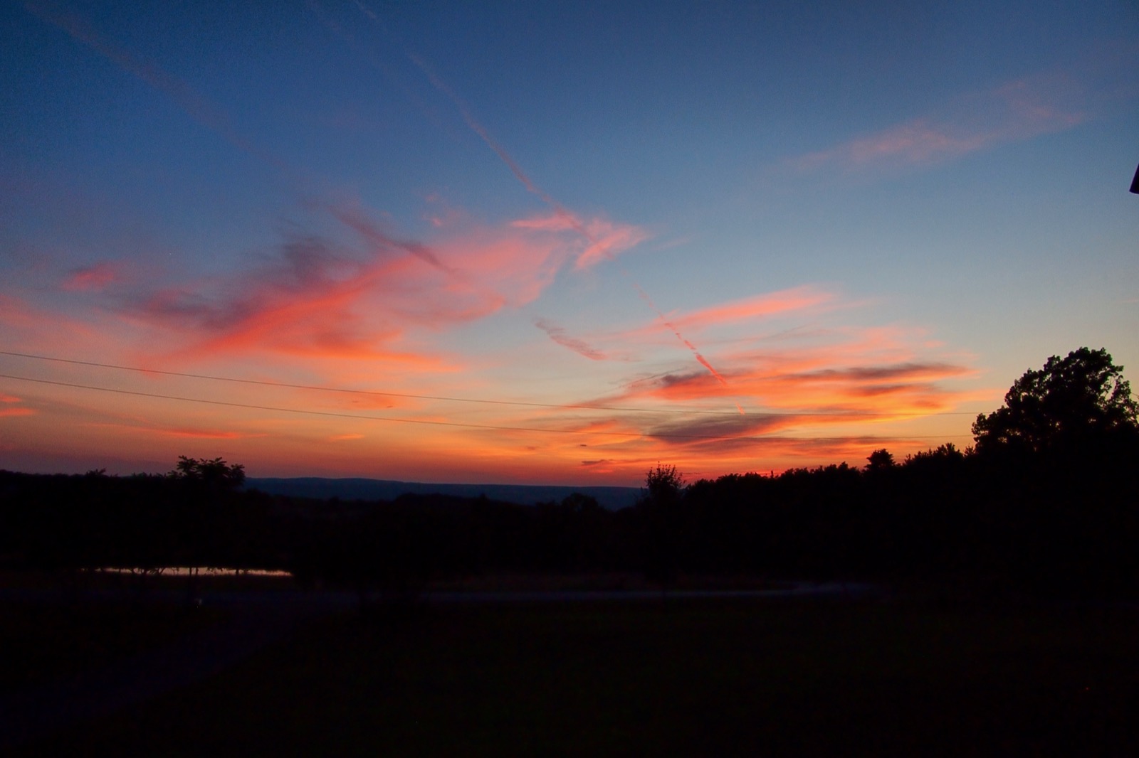Clouds illuminted from below by the setting sun