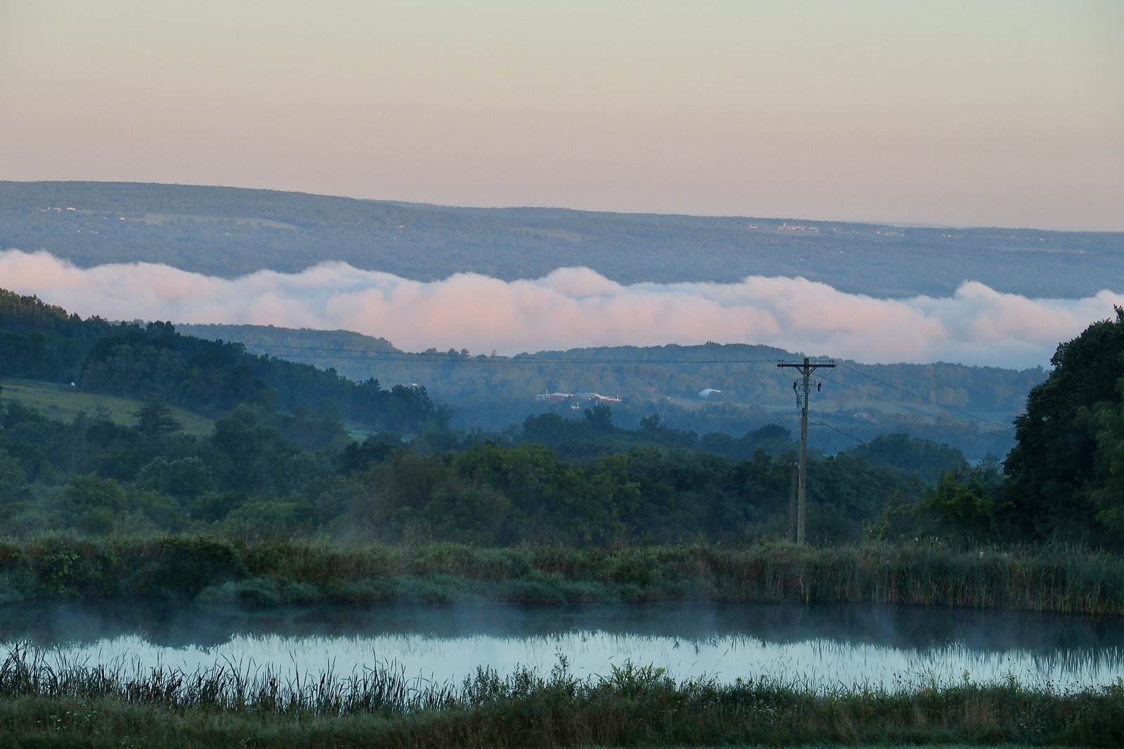 Low clouds complete Seneca Lake, beneath the hills.